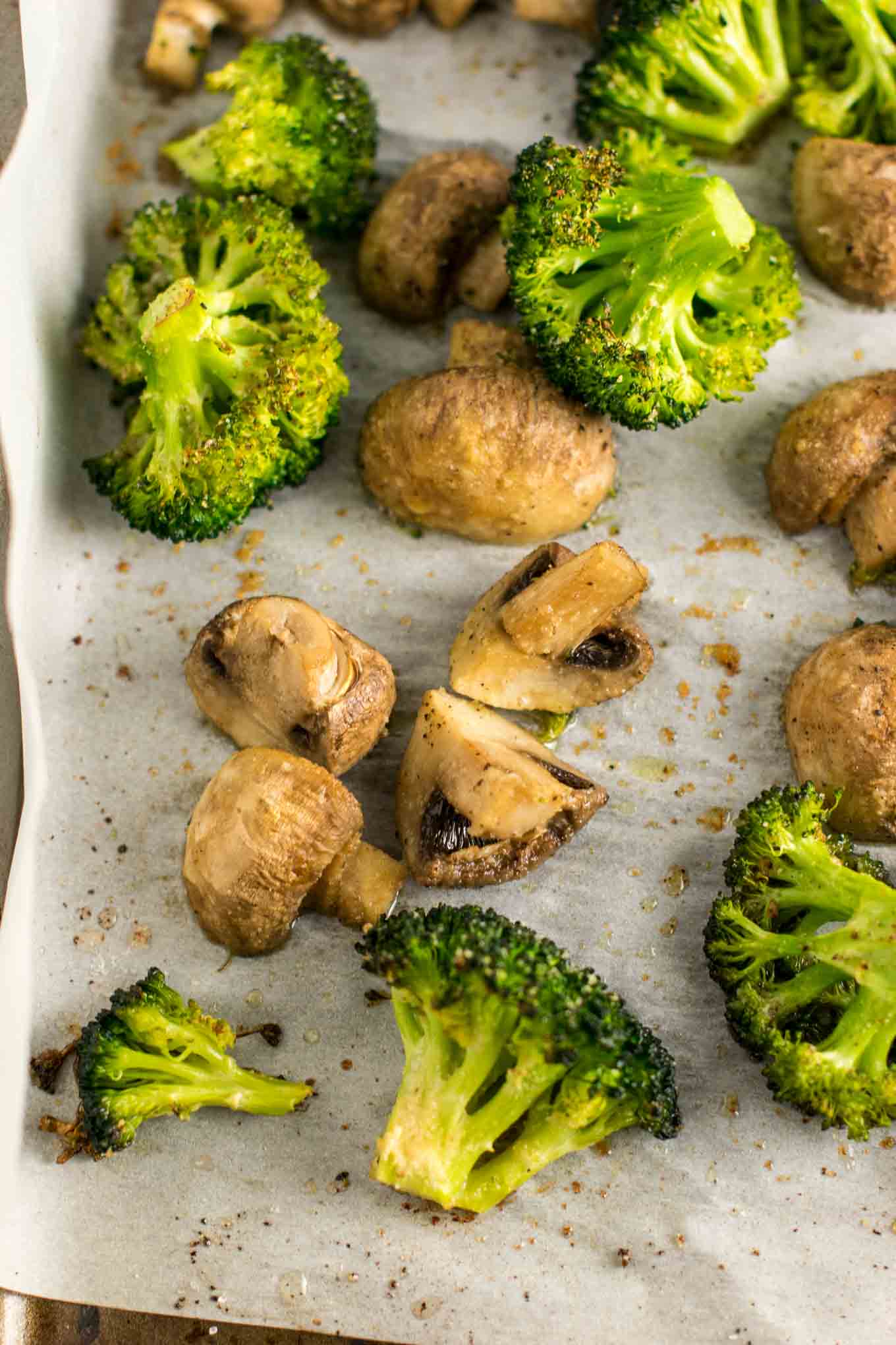 Roasted broccoli and mushrooms recipe - easy side dish! This was so easy and really good. We will be making it a lo! #broccoliandmushrooms #vegan #sidedish #dinner #glutenfree #broccoli #mushrooms #easysidedish #mushrooms