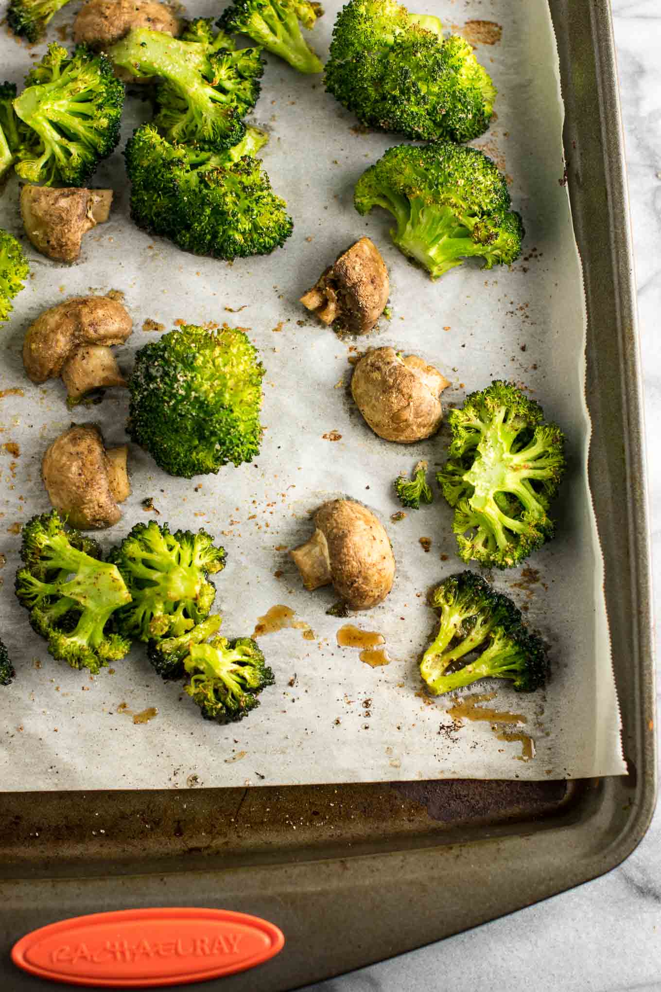 Roasted broccoli and mushrooms recipe - easy side dish! This was so easy and really good. We will be making it a lo! #broccoliandmushrooms #vegan #sidedish #dinner #glutenfree #broccoli #mushrooms #easysidedish #mushrooms