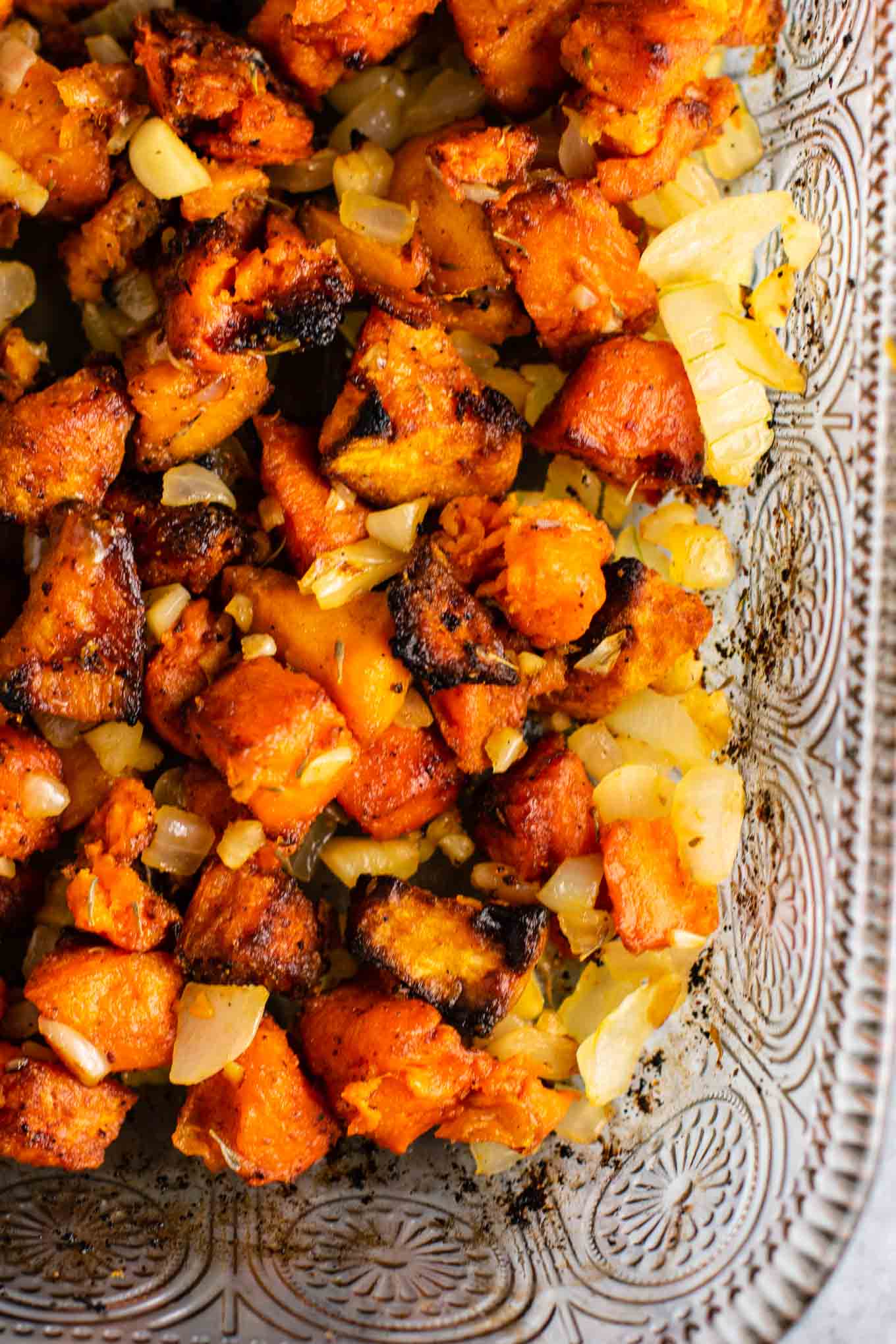 crispy sweet potatoes with garlic and onion