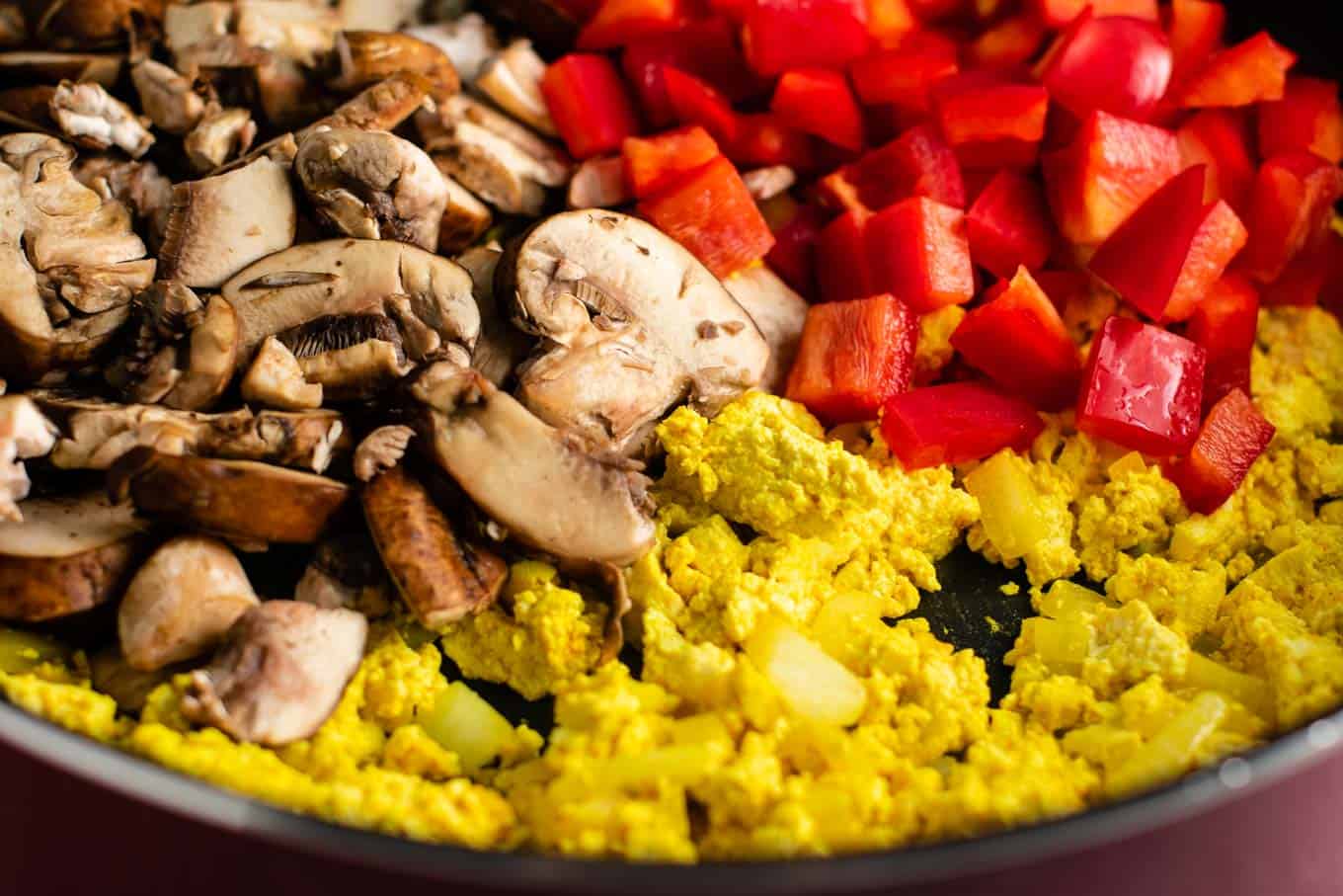 Tofu scrambled eggs with bell pepper and mushroom. This tastes amazing and was really satisfying! #tofuscramble #vegan #breakfast #veganbreakfast #meatless #dairyfree #eggfree