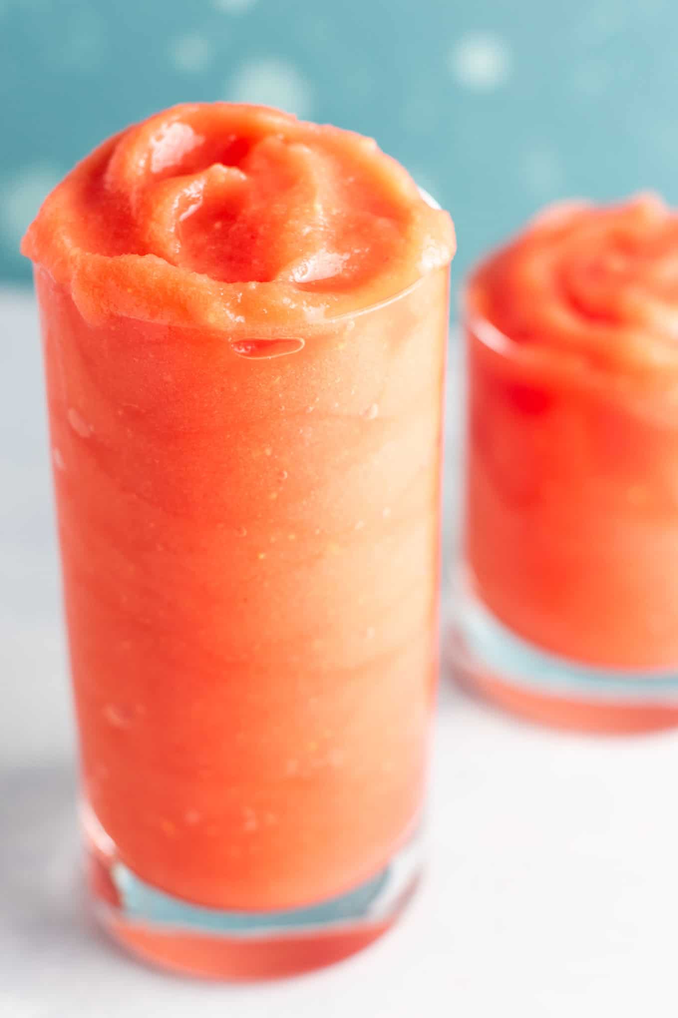 Watermelon gin slushies - the perfect way to cool off this summer! #watermeon #gin #slushies #drinks #healthy #watermelonslushie #vegan 