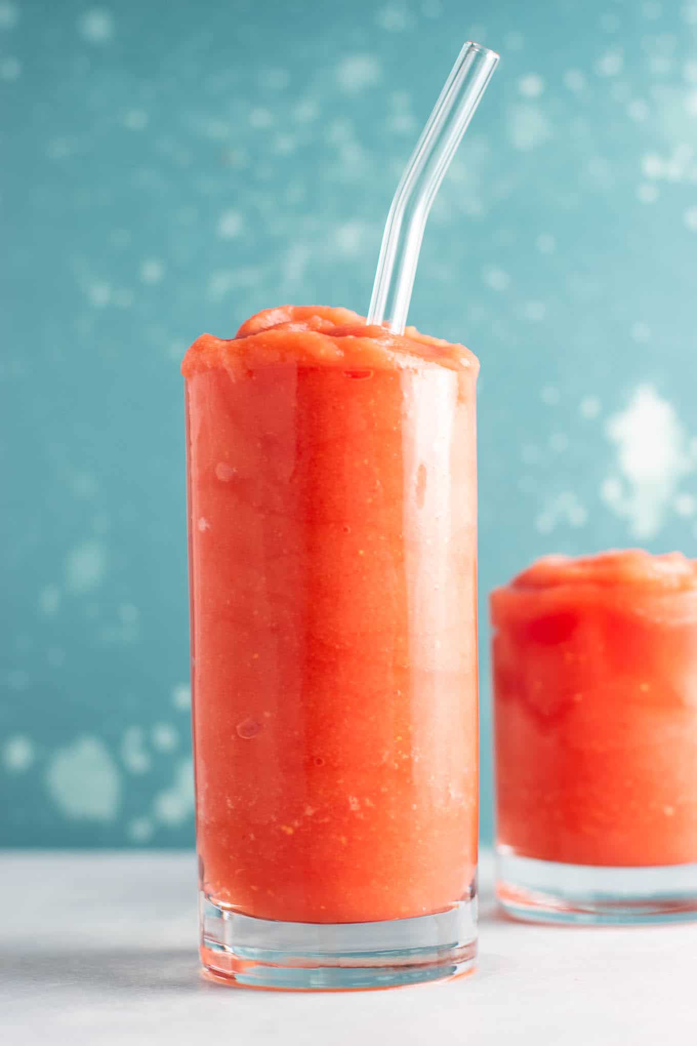 Watermelon gin slushies - the perfect way to cool off this summer! #watermeon #gin #slushies #drinks #healthy #watermelonslushie #vegan 