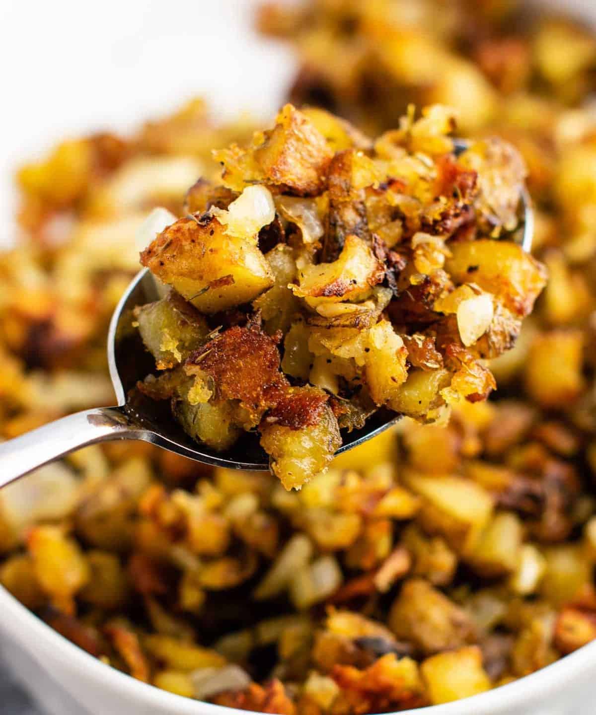 This famous crispy potato casserole is SO GOOD! Perfectly crispy potatoes slow roasted to perfection. One of the best vegan potato recipes! #potatocasserole #vegan #veganpotatorecipes #dinner #potatoes #healthy