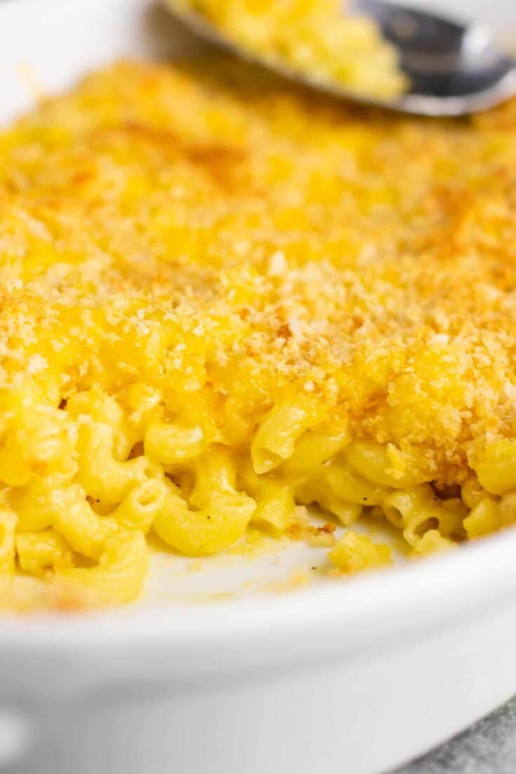 Homemade baked macaroni and cheese recipe. Classic baked comfort food that the whole family will love! #macaroniandcheese #bakedmacaroniandcheese #comfortfood #sidedish #macandcheese #soulfood