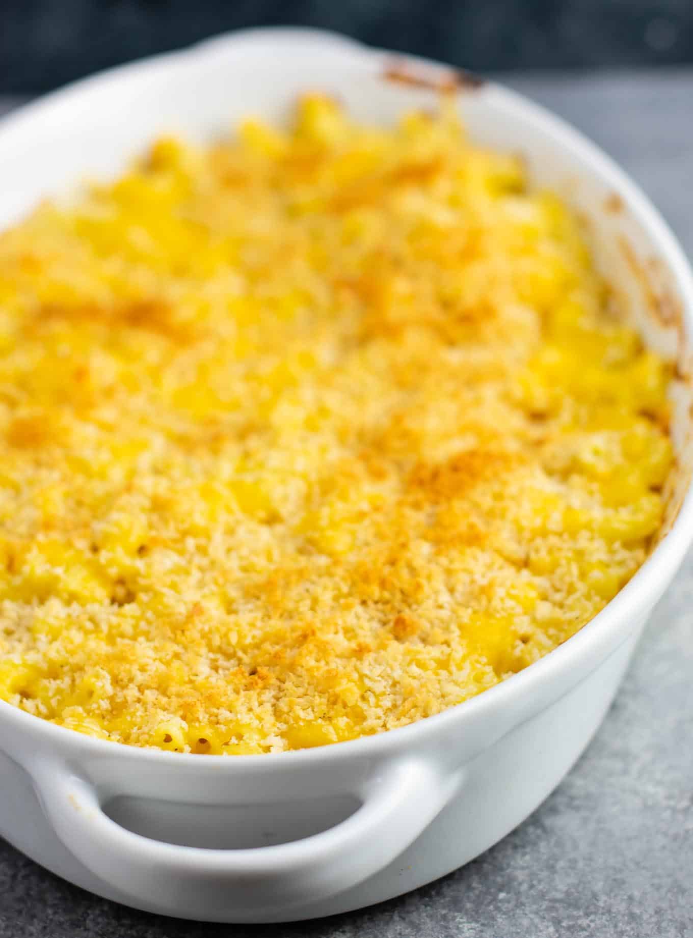 Homemade baked macaroni and cheese recipe. Classic baked comfort food that the whole family will love! #macaroniandcheese #bakedmacaroniandcheese #comfortfood #sidedish #macandcheese #soulfood 
