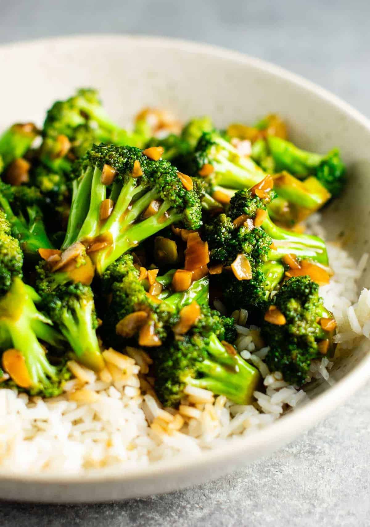 vegan dinner recipes - Chinese broccoli with garlic sauce recipe – this is so easy to make and the stir fry sauce is only 3 ingredients! Tastes just like takeout. #broccoliwithgarlicsauce #stirfry #stirfrysauce #broccolistirfry #vegan #vegetarian #sidedish #chinese