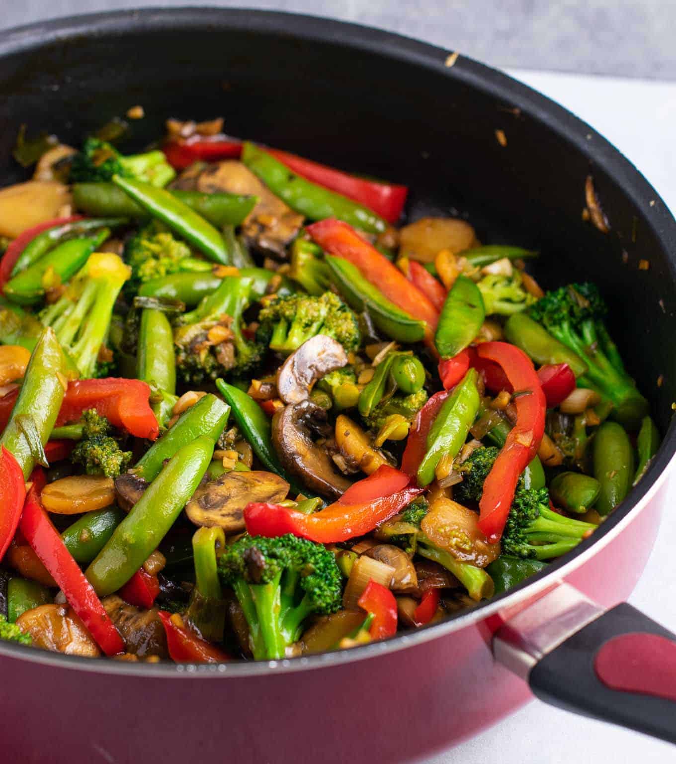 Stir fry with bell pepper, sugar snap peas, broccoli, garlic, ginger, and sauce