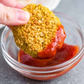chickpea nugget dipped in ketchup