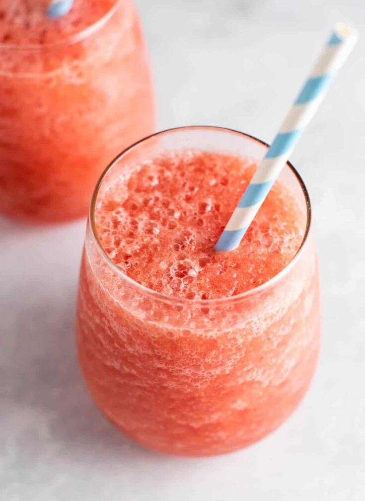 Watermelon white wine slushies – these are perfect for summer! #whitewineslushie #whitewineslushies #slushierecipe #watermelon #drink #summer #alcohol
