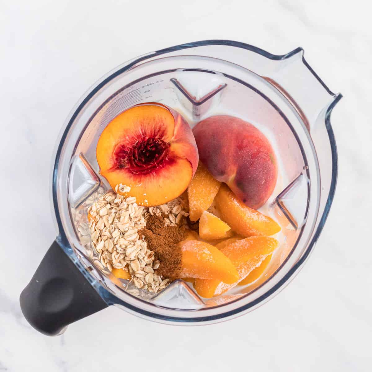 peach smoothie ingredients in the blender