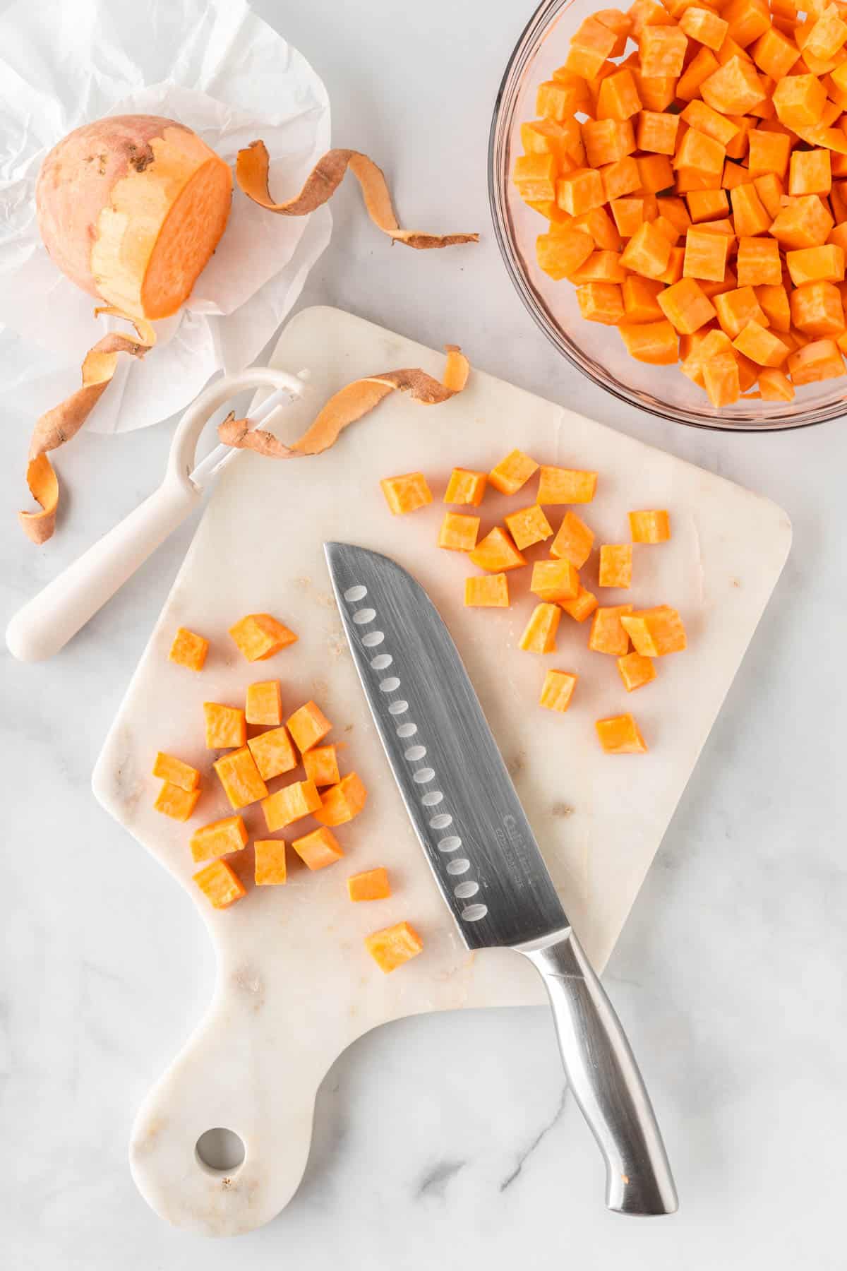 cutting sweet potatoes into chunks