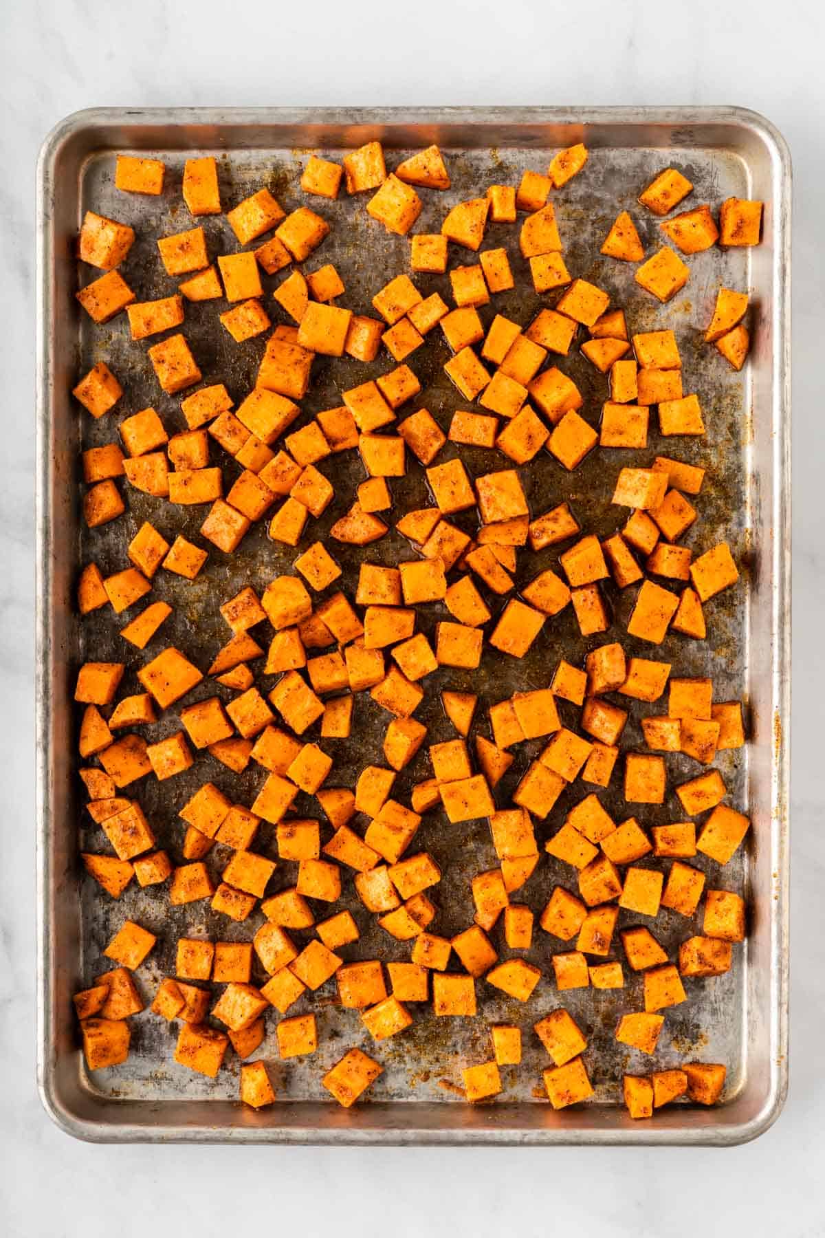 sweet potatoes on a baking sheet