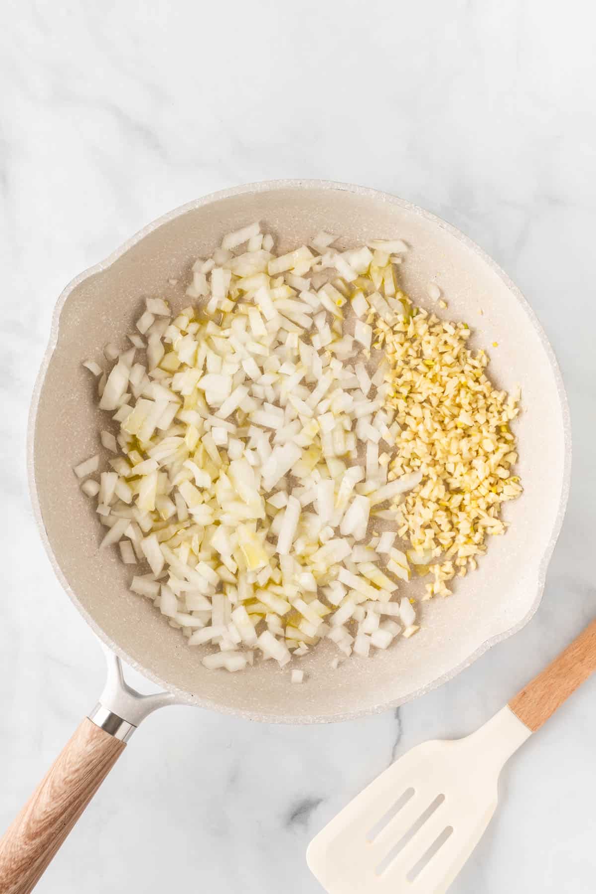garlic and onion in a skillet