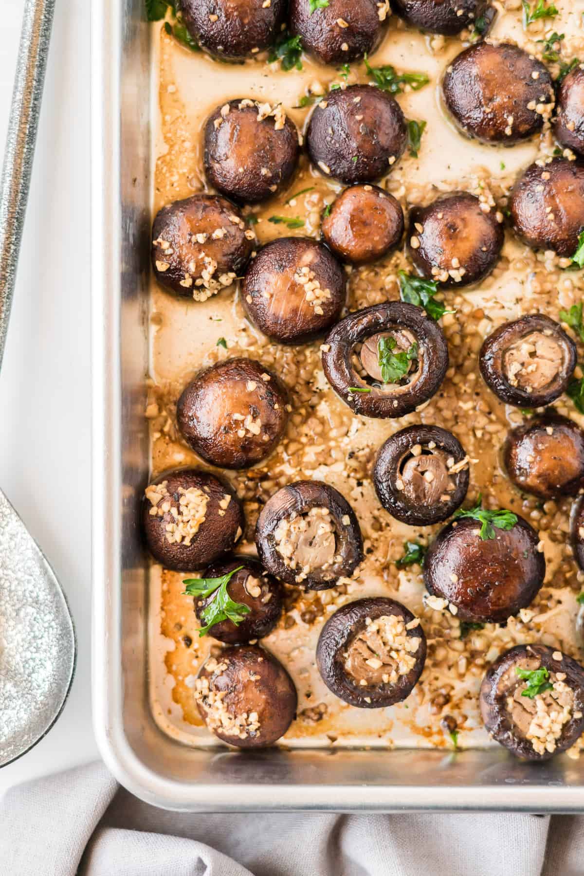 roasted garlic mushrooms on a baking sheet