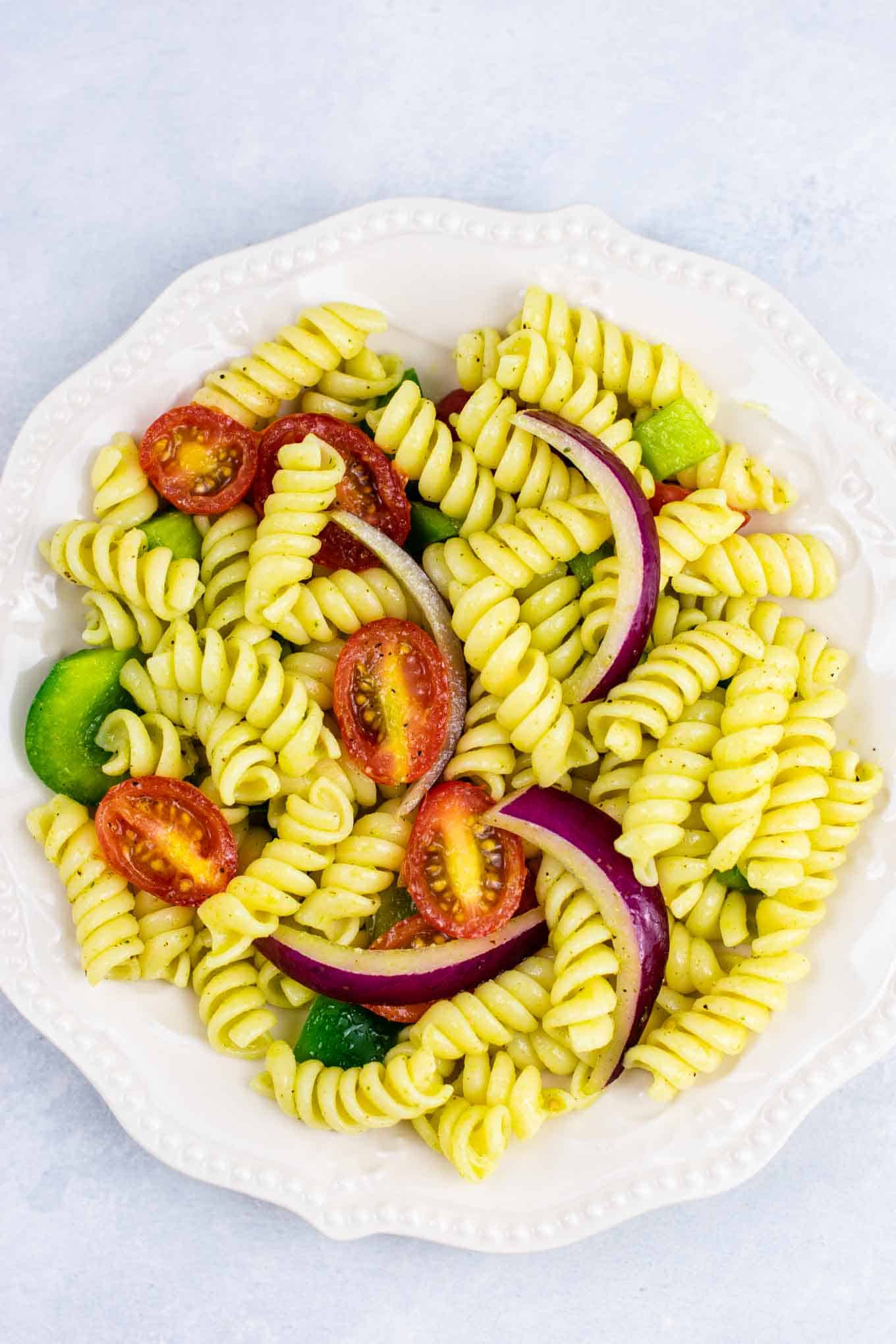 Vegan cold pasta salad recipe – this was AMAZING! So much flavor and really easy to make. #vegan #pastasalad #vegetarian #sidedish #summer #meatless #dairyfree #healthyrecipe #veganpastasalad