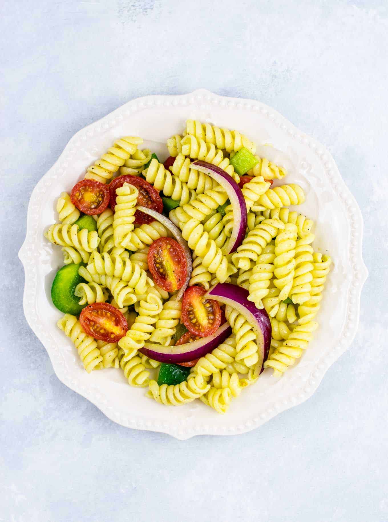 Vegan cold pasta salad recipe – this was AMAZING! So much flavor and really easy to make. #vegan #pastasalad #vegetarian #sidedish #summer #meatless #dairyfree #healthyrecipe #veganpastasalad