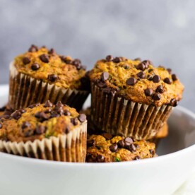 Healthy zucchini chocolate chip muffins made with easy ingredients. Perfect for using up all of that summer zucchini! #zucchini #muffins #chocolatechip #healthy #breakfast #vegetarian