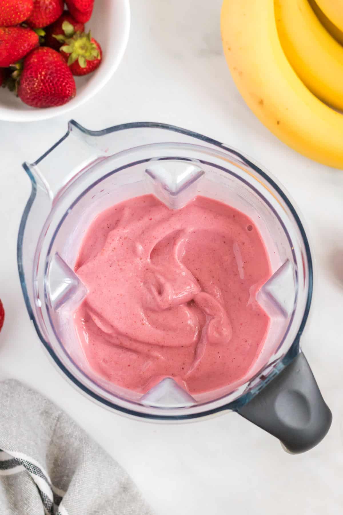 strawberry banana smoothie in a blender