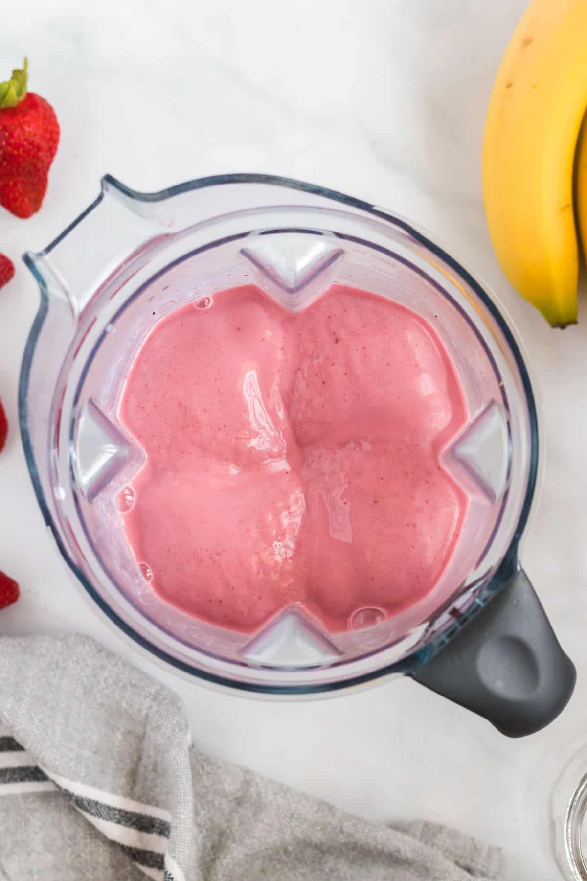 strawberry banana smoothie in a blender