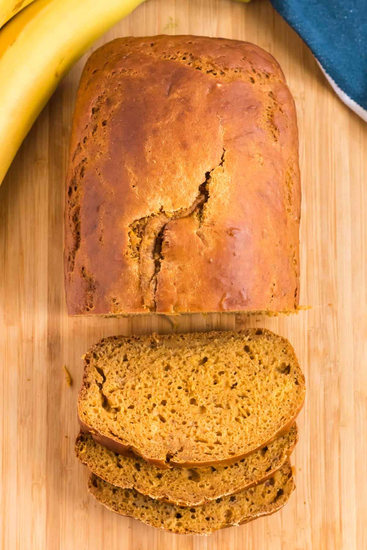 pumpkin bread being cut into slices