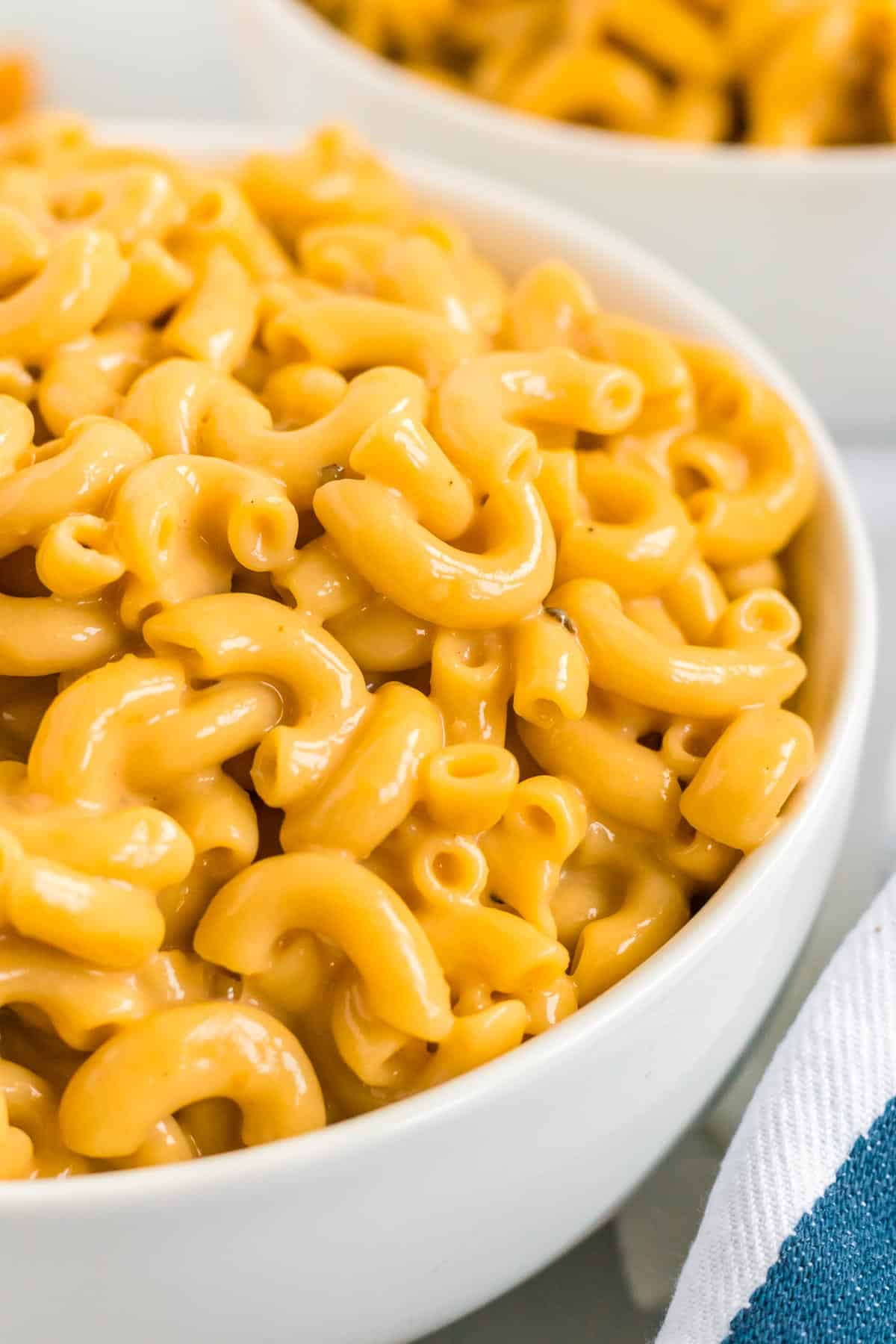 mac and cheese in a white bowl