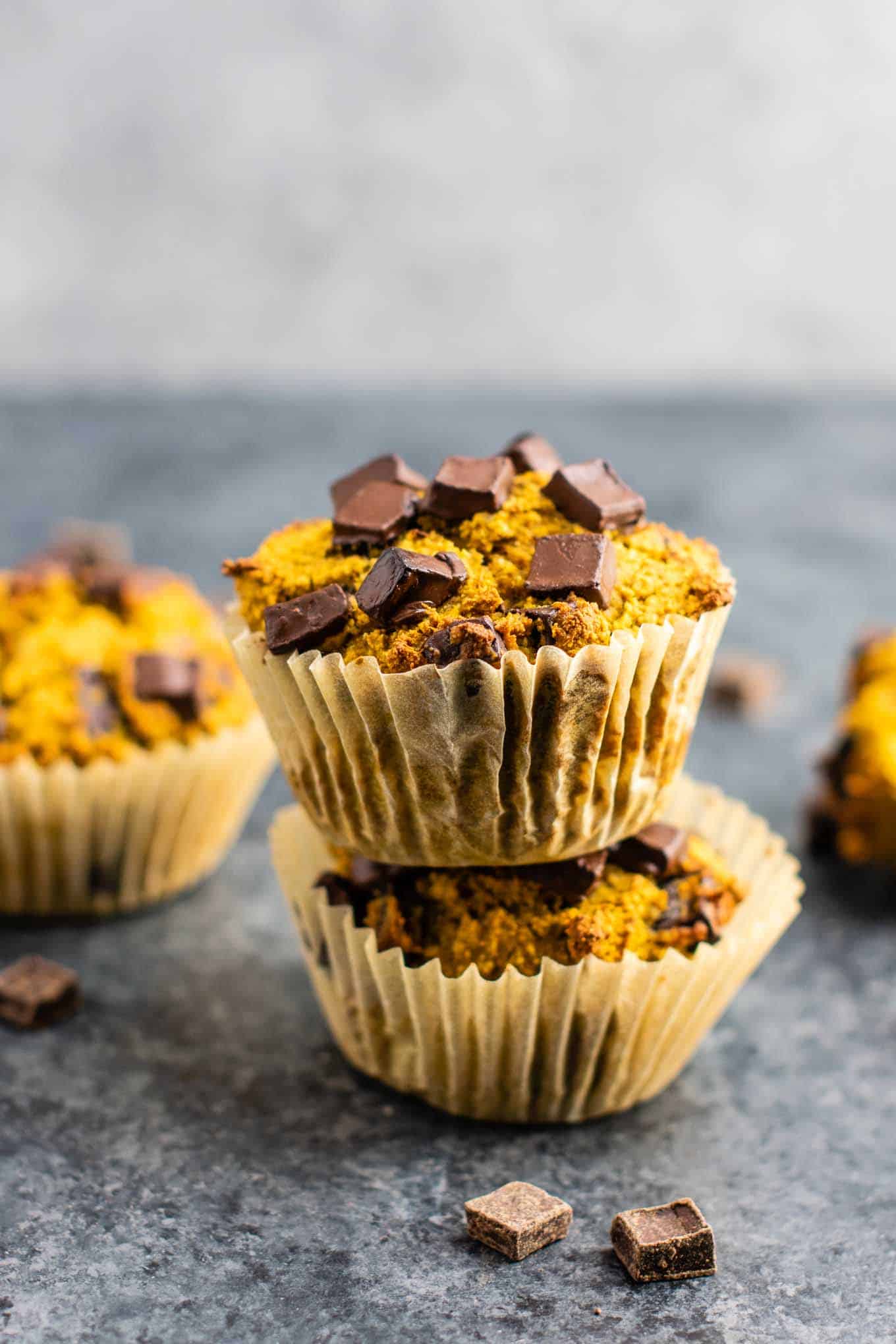 Gluten free pumpkin muffins with dark chocolate chips stacked