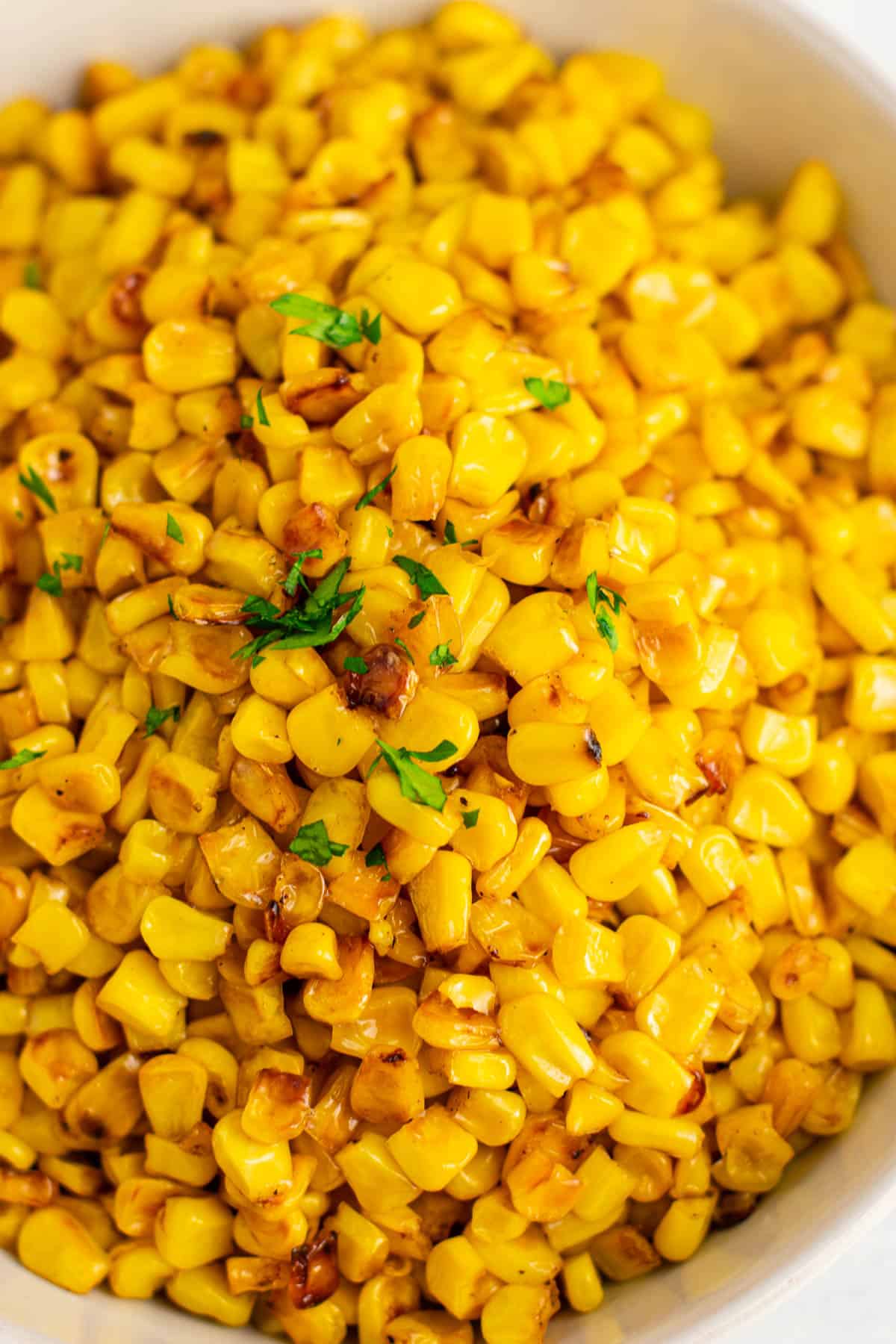 corn topped with parsley