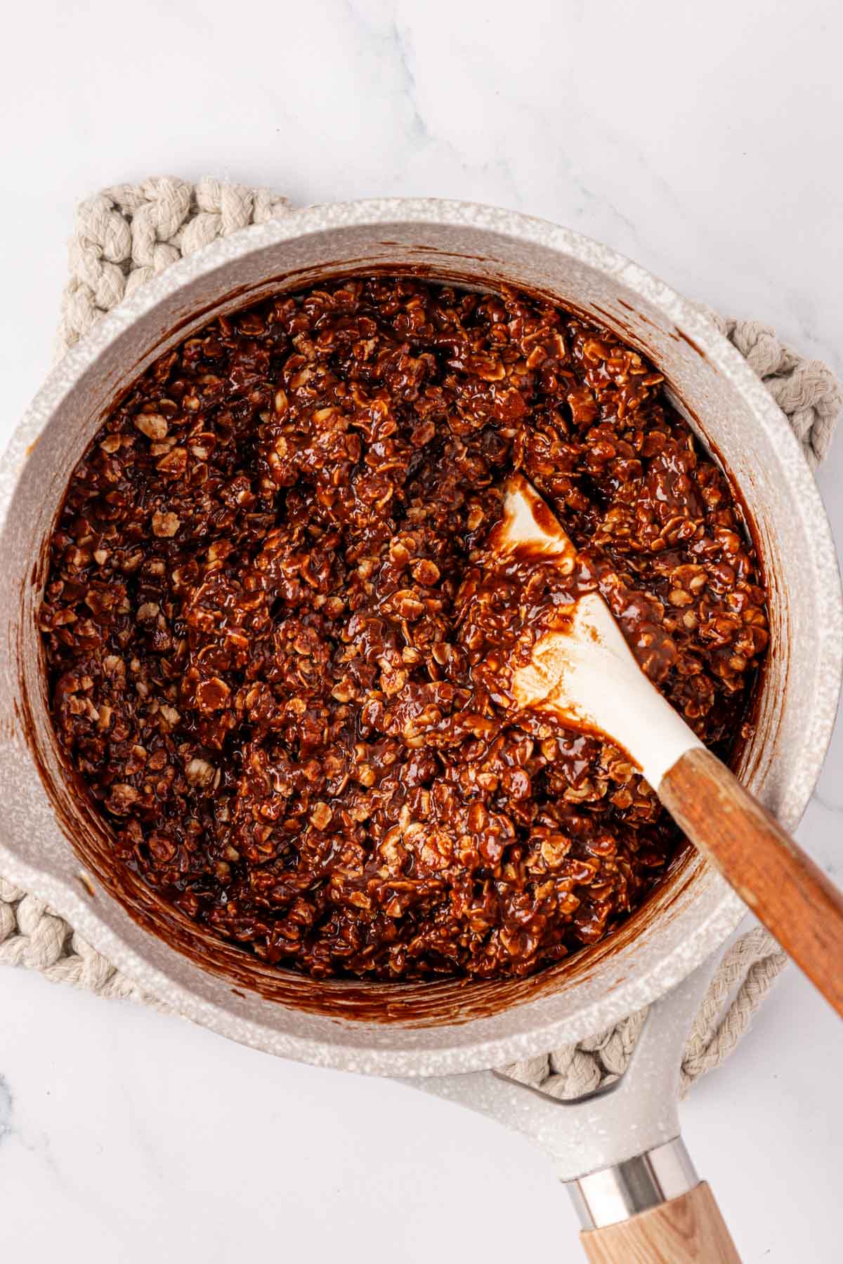 no bake cookie filling mixed together in a sauce pan