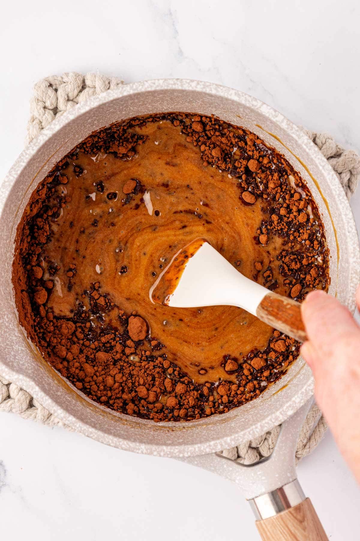 stirring the cacao powder kn