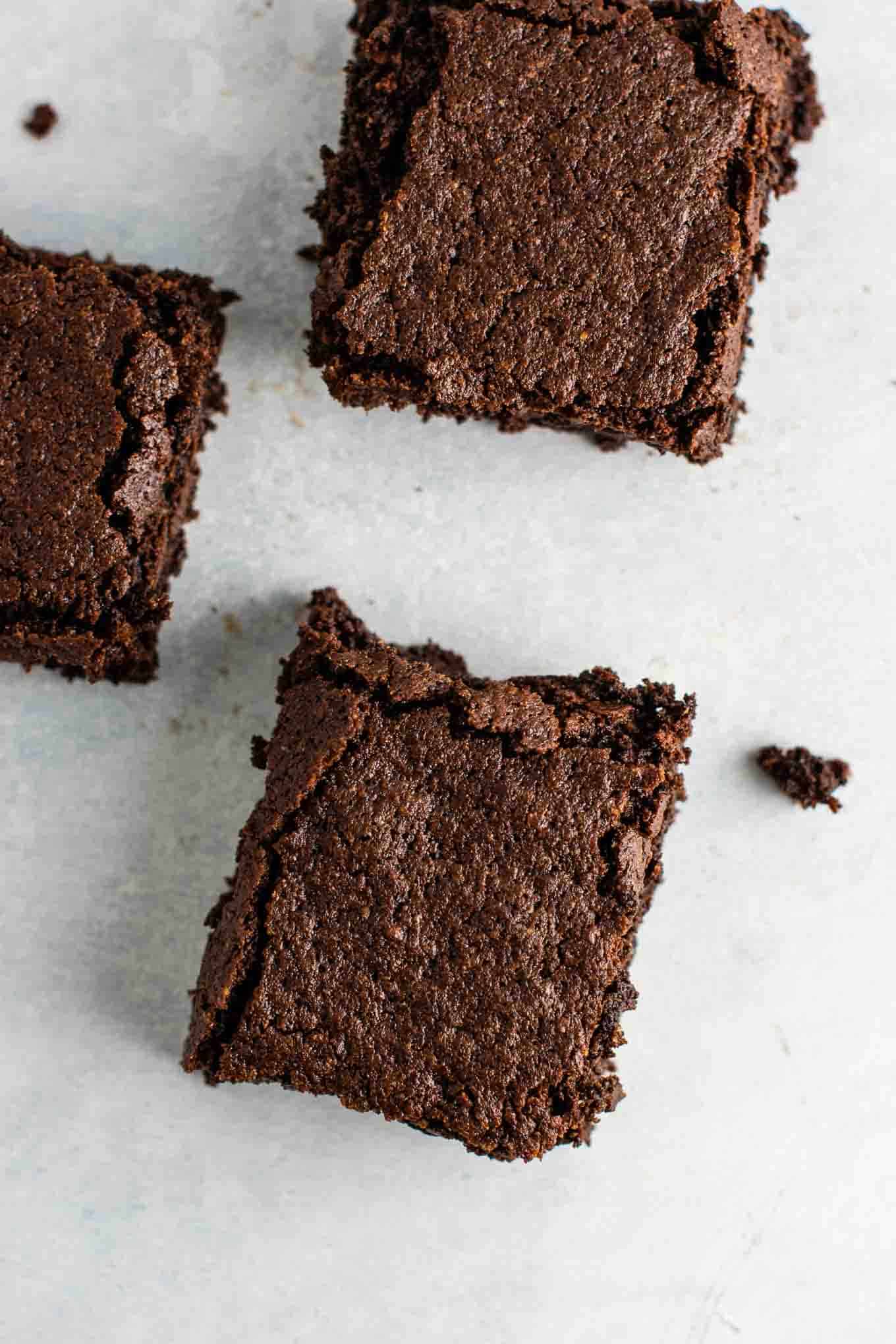 Easy gluten free brownie recipe made with oat flour and coconut flour. Dairy free, fudgy, and taste amazing! #glutenfreebrownies #glutenfree #glutenfreedessert #dessert #brownies #oatflour #coconutflour