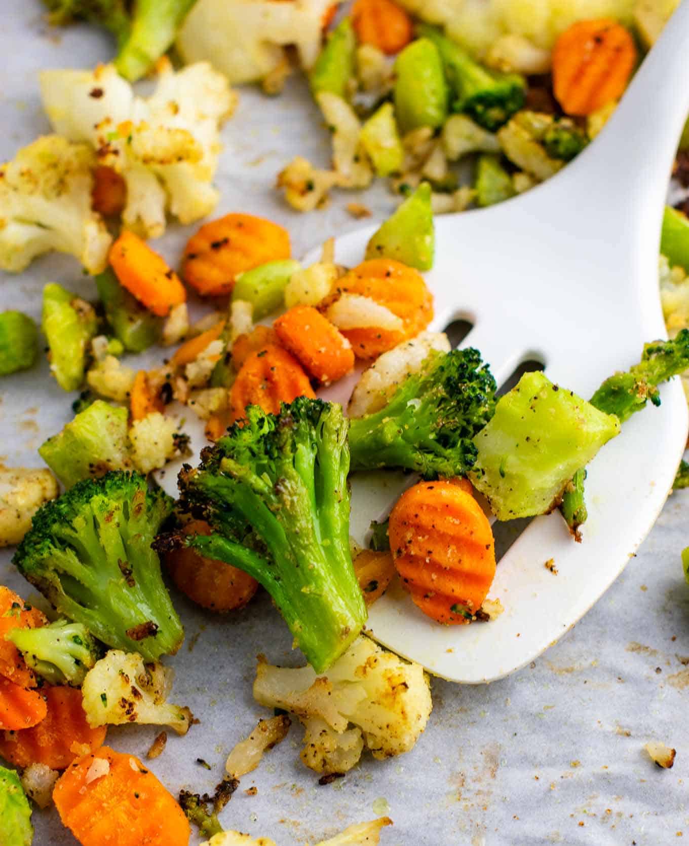 vegetables with a white spatula