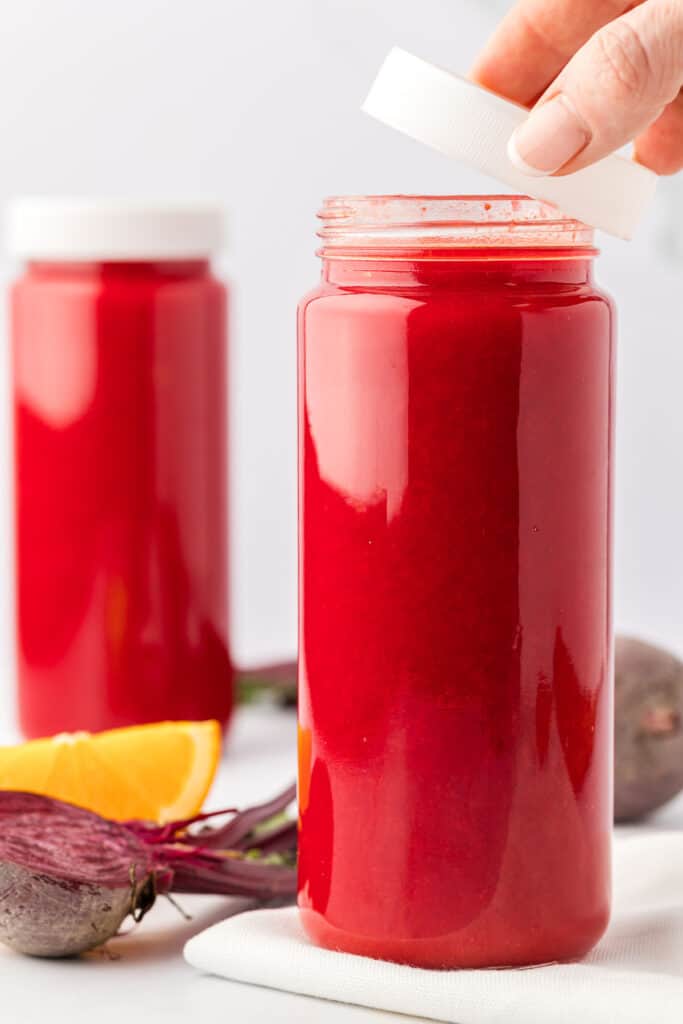 beet and carrot juice in a storage glass
