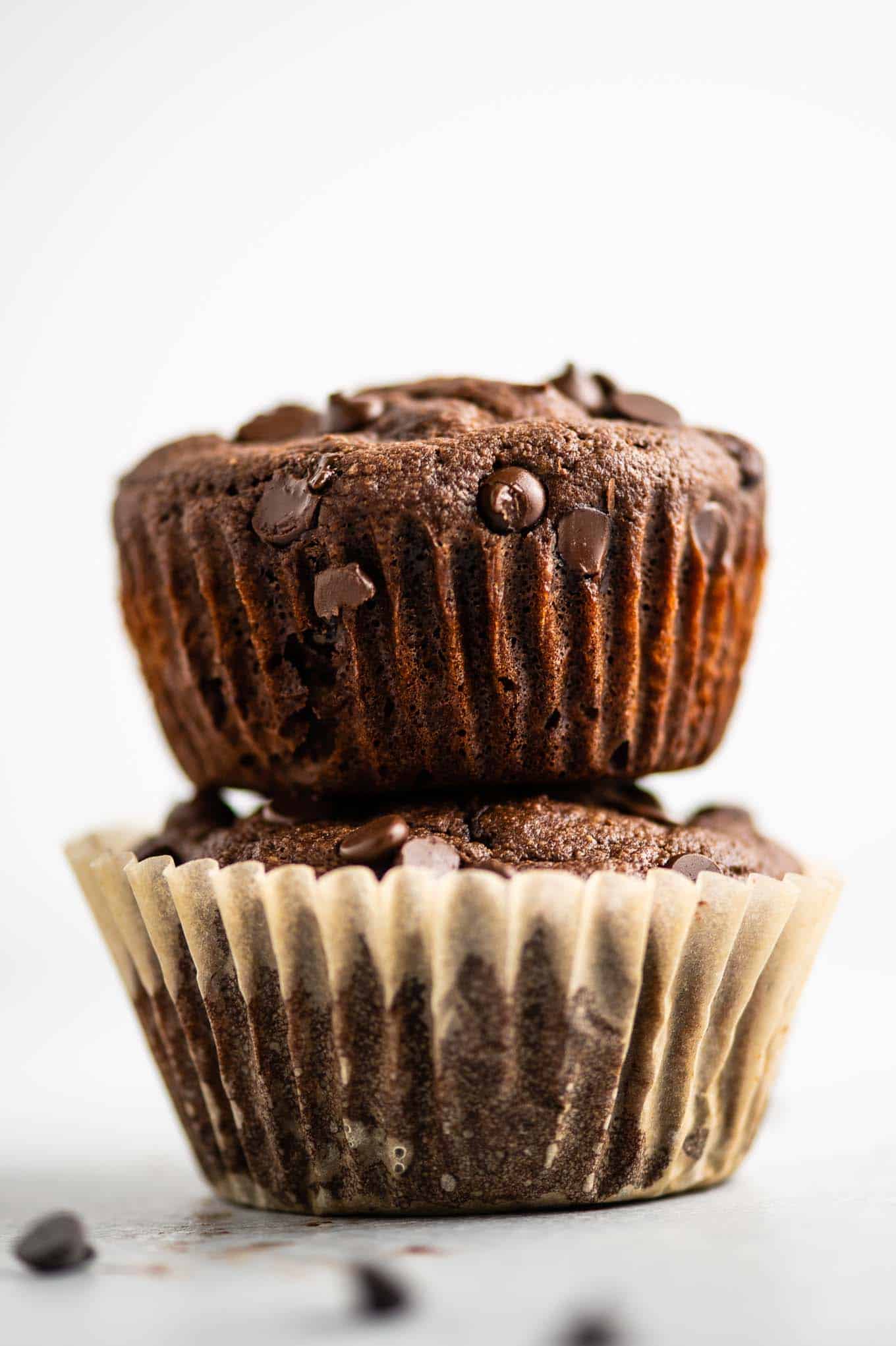 two gluten free chocolate muffins stacked