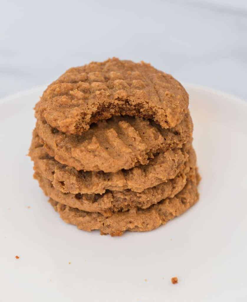 5 cookies stacked on a plate