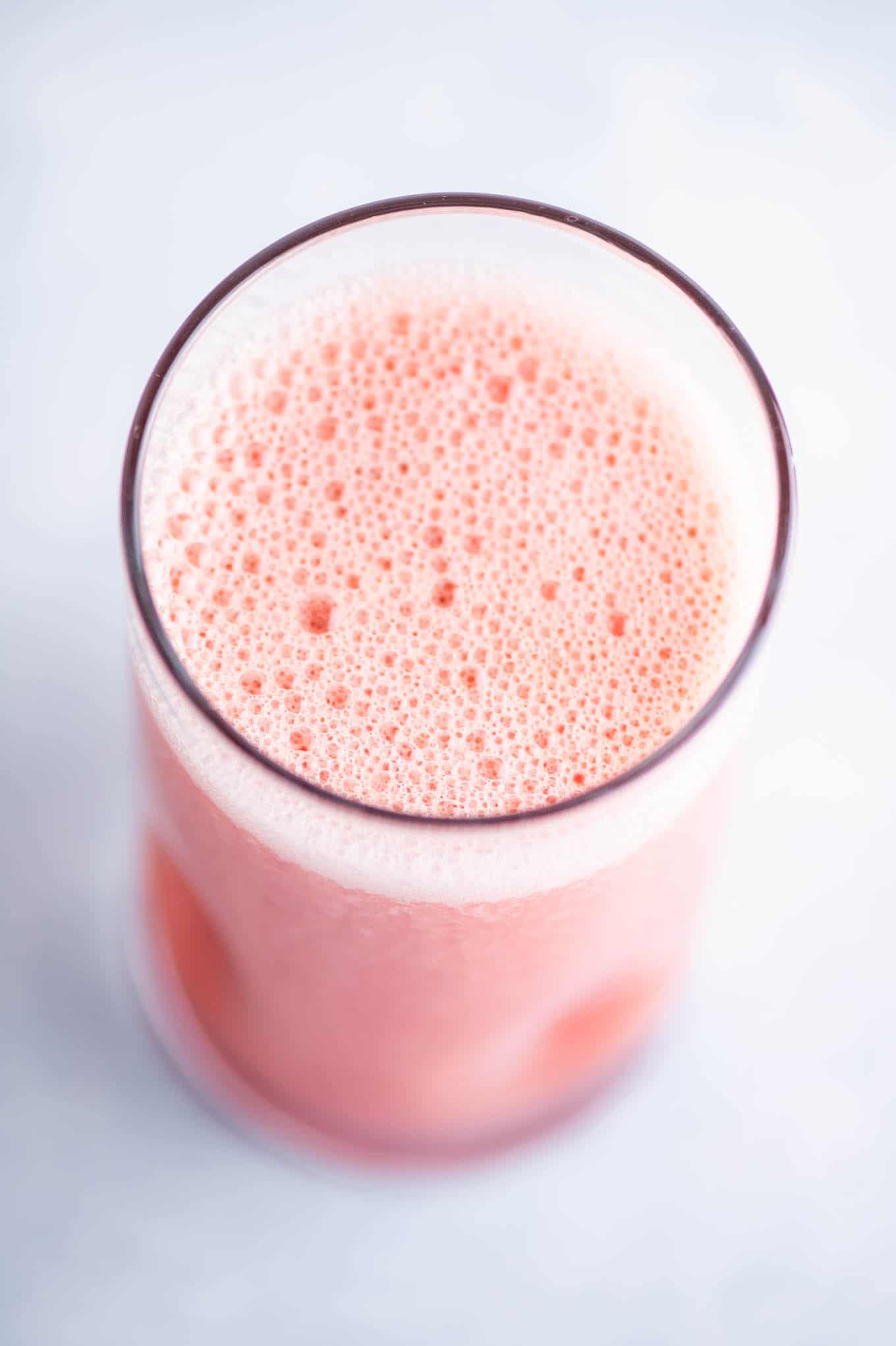 watermelon juice from an overhead view showing bubbles on top