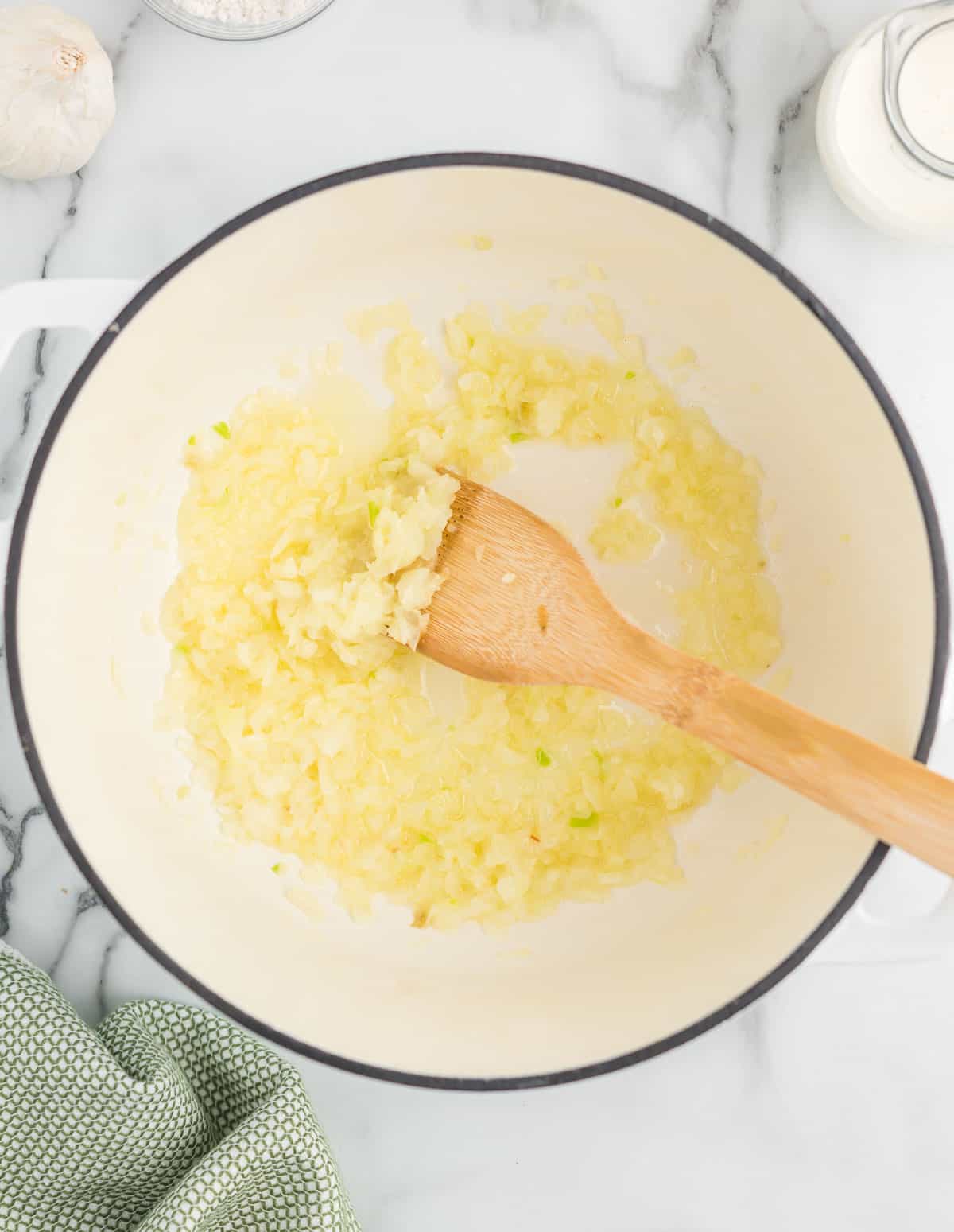 cooking garlic and onion in a dutch oven