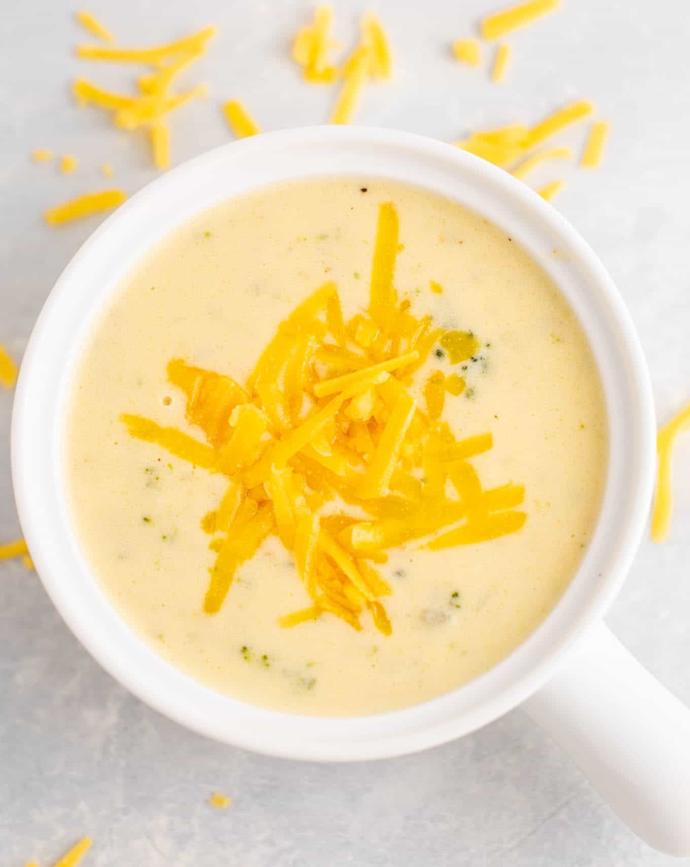broccoli and cheddar cheese soup with cheese on top