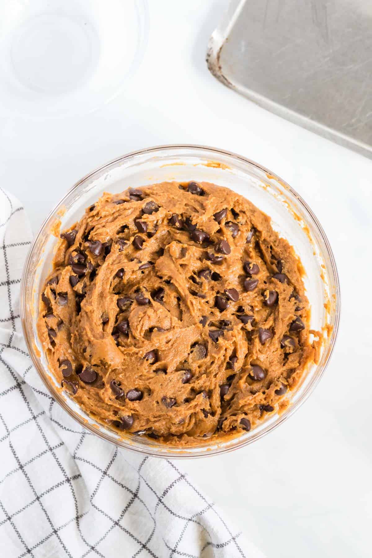pumpkin chocolate chip cookie batter in a bowl