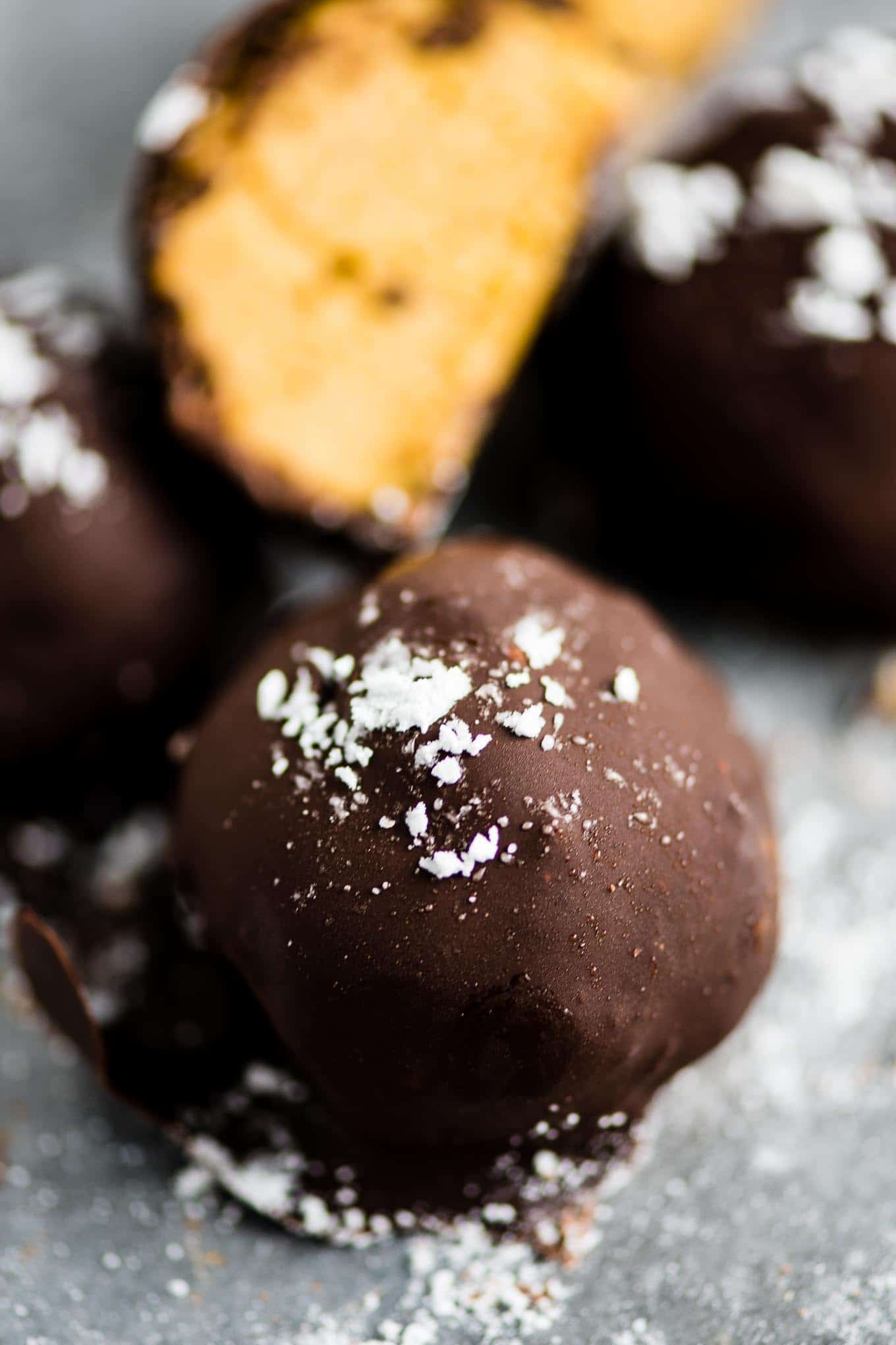 pumpkin cheesecake truffles sprinkled with powdered sugar