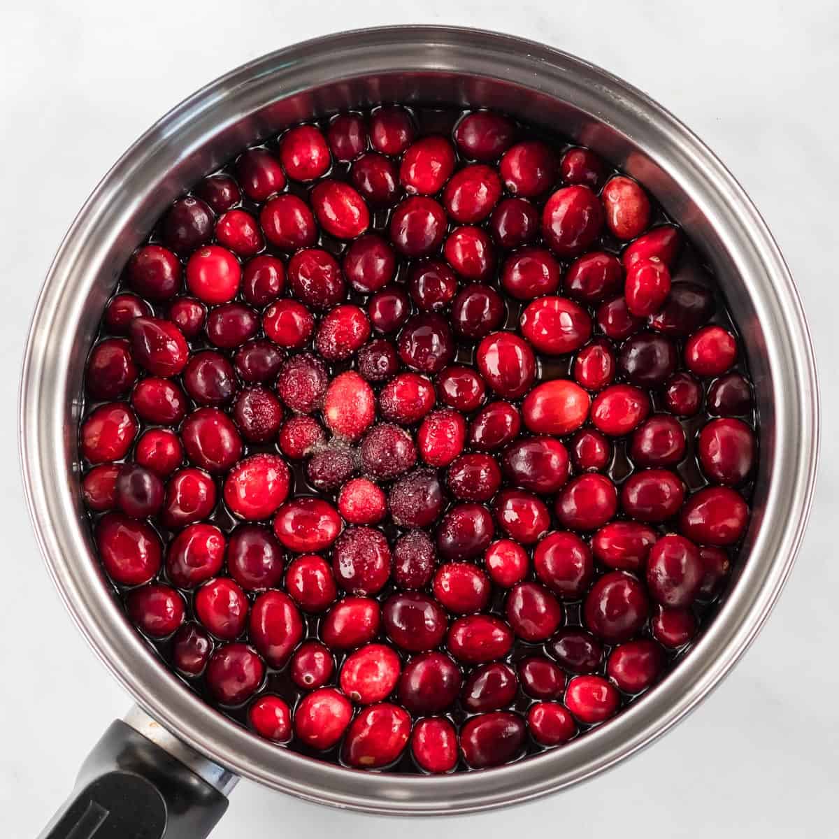 cranberry sauce ingredients in the sauce pan