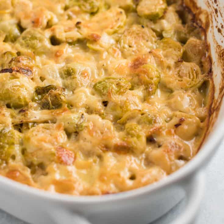 cheesy brussel sprouts in a baking dish
