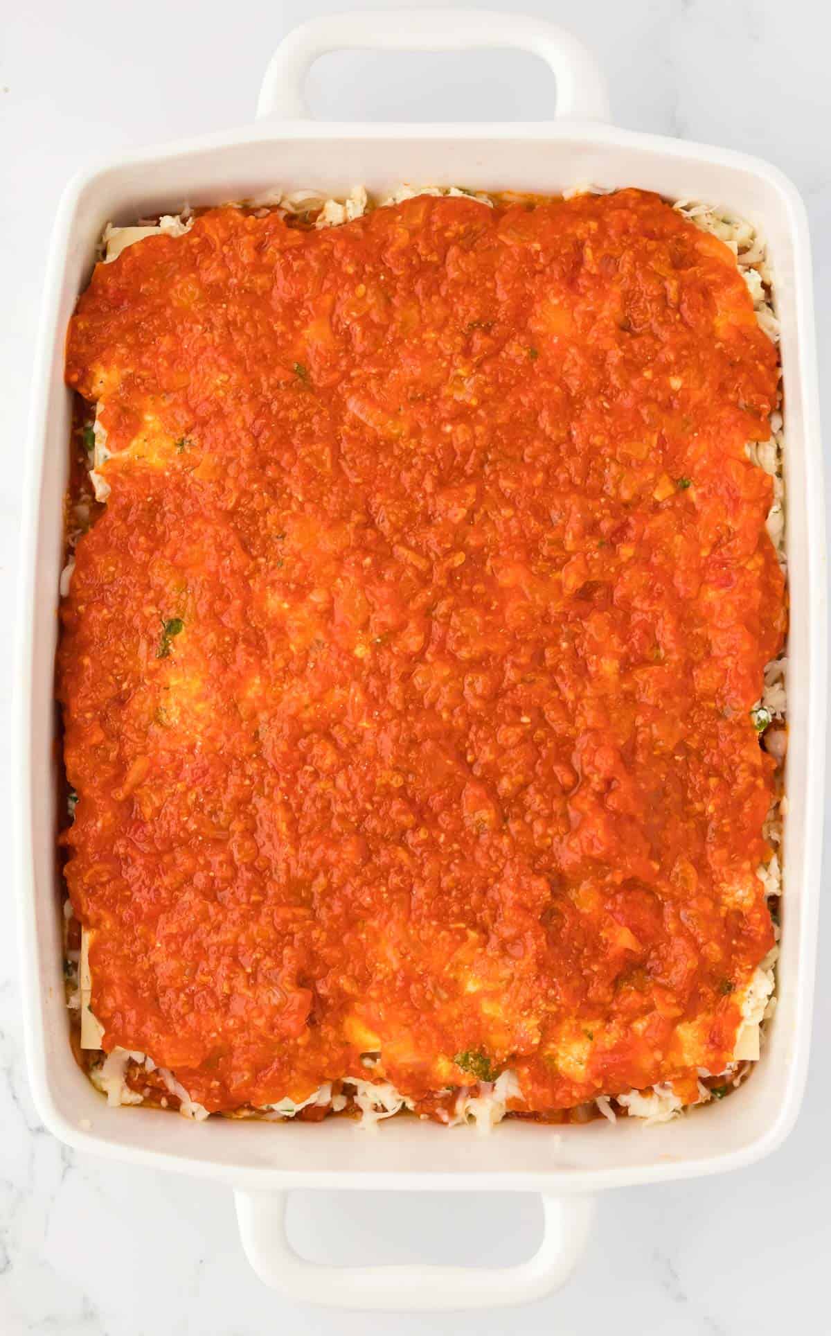 sauce on top of lasagna