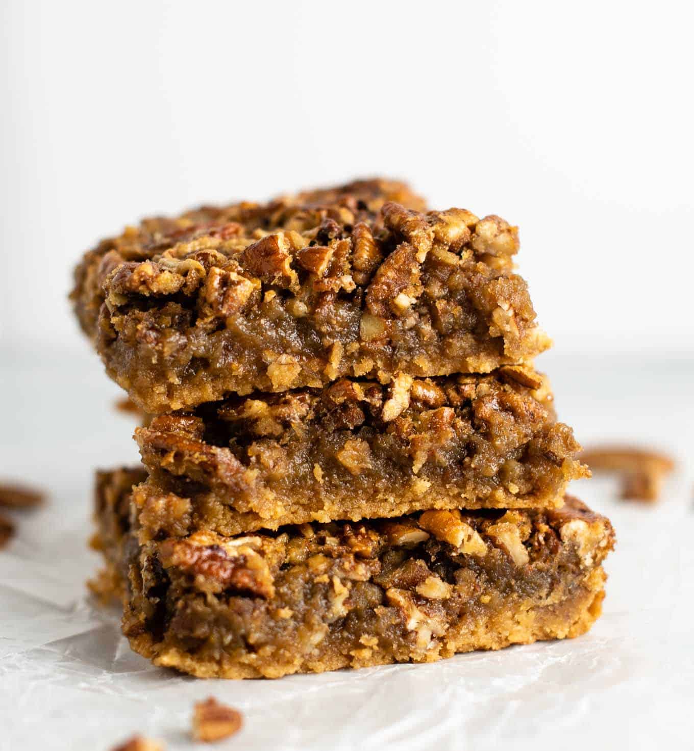 a stack of three pecan pie bars