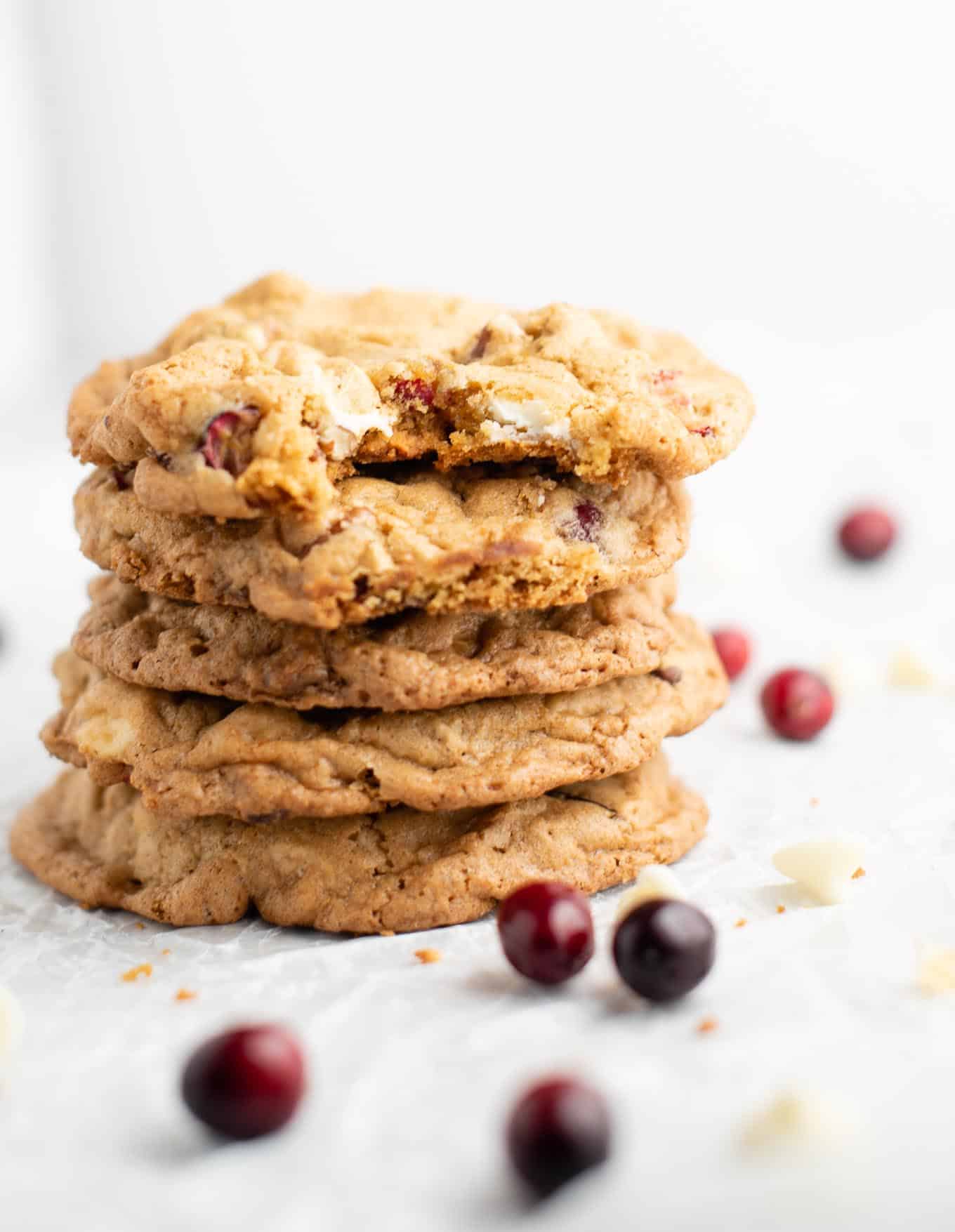 stacked cookies with one taken a bite out of