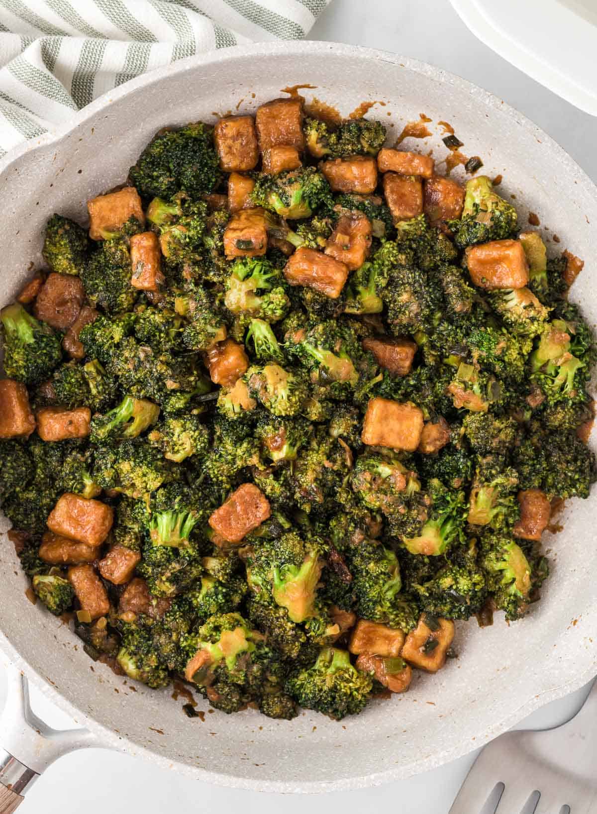 broccoli tofu stir fry in a skillet