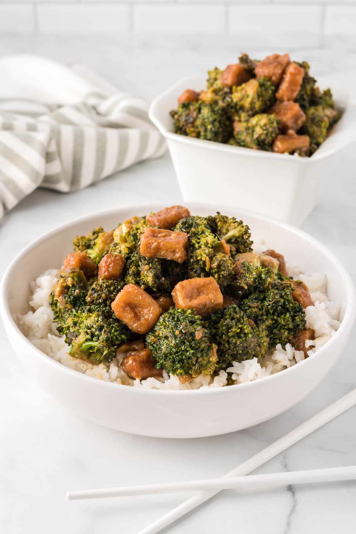 broccoli tofu stir fry in a white bowl