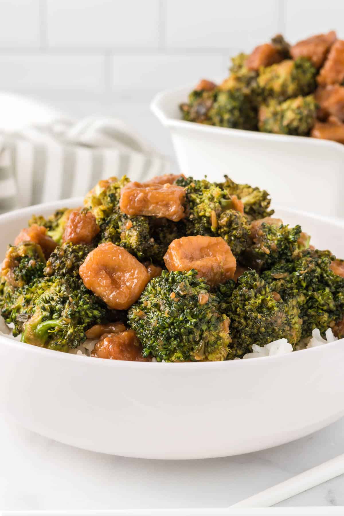 broccoli tofu stir fry in a white bowl