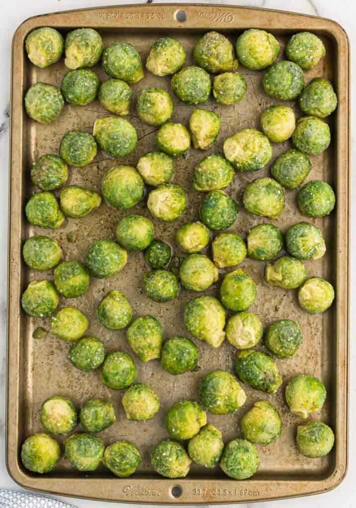 frozen brussels sprouts on a baking dish