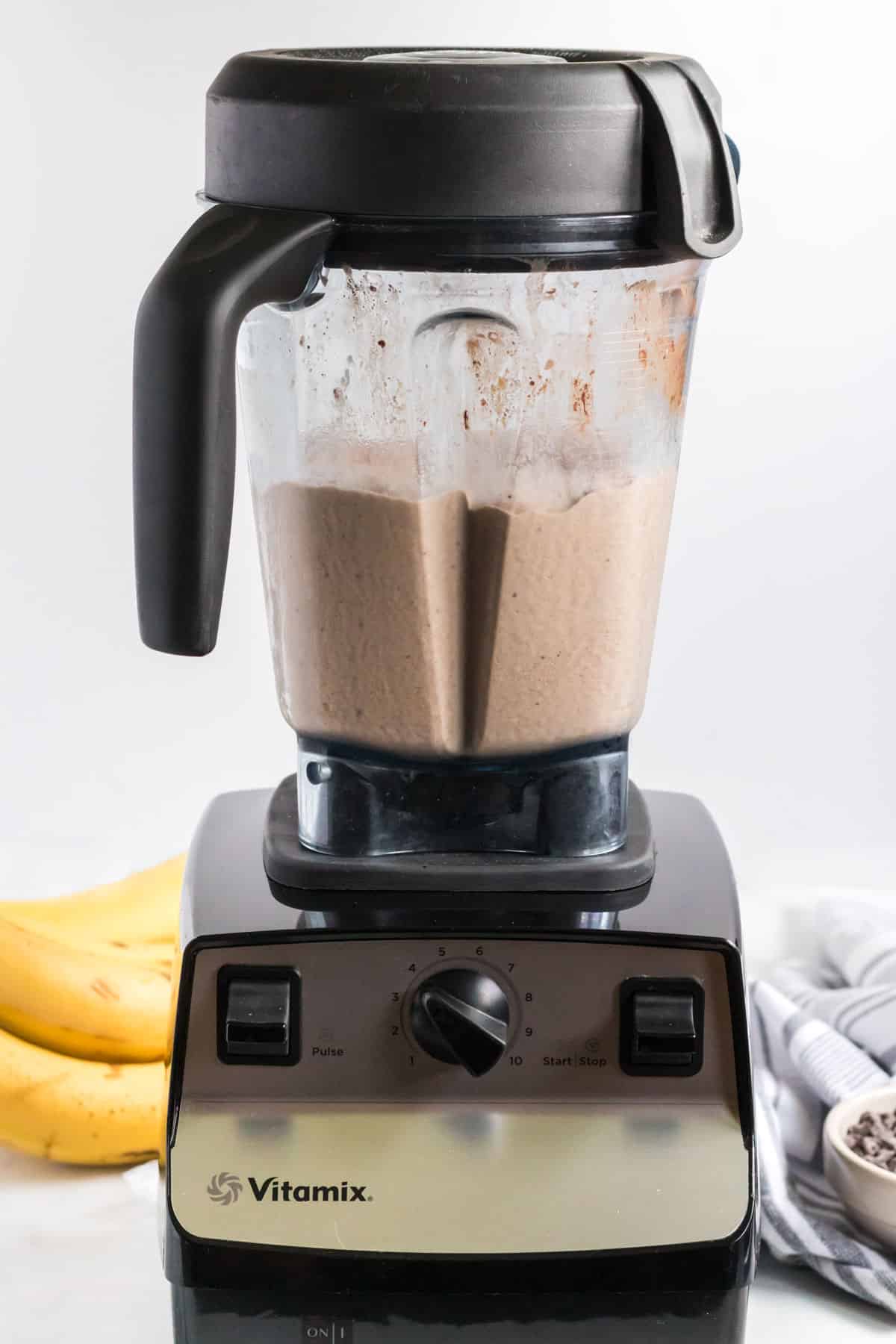 blended healthy chocolate peanut butter banana smoothie in the blender