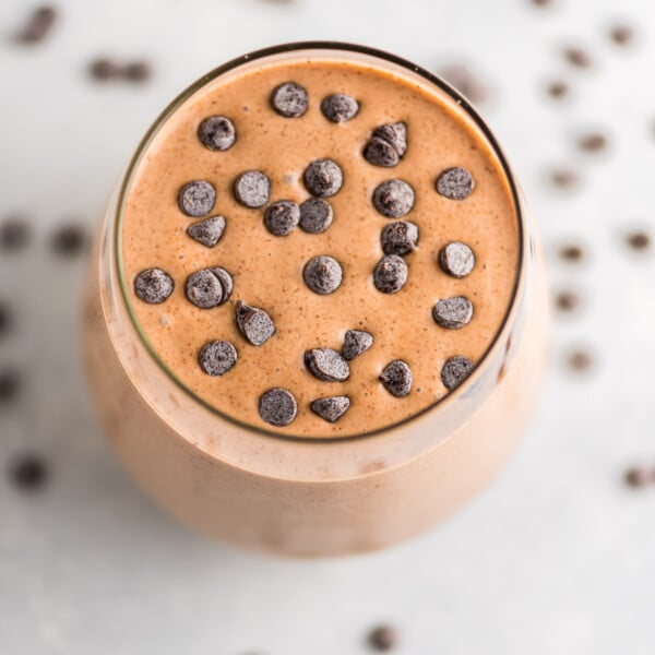 chocolate peanut butter banana smoothie topped with mini chocolate chips